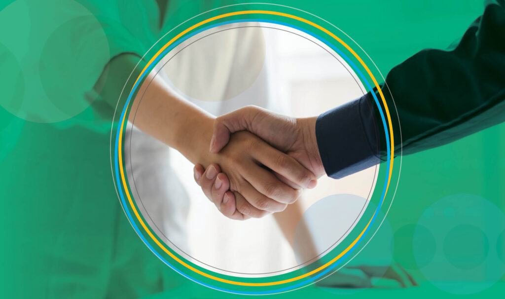 A handshake closing a business deal symbolizing an Independent PBM partnering with an independent channel partner